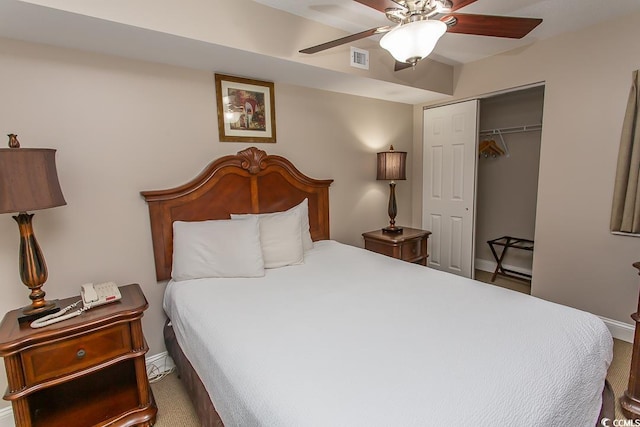 bedroom featuring ceiling fan, carpet floors, and a closet