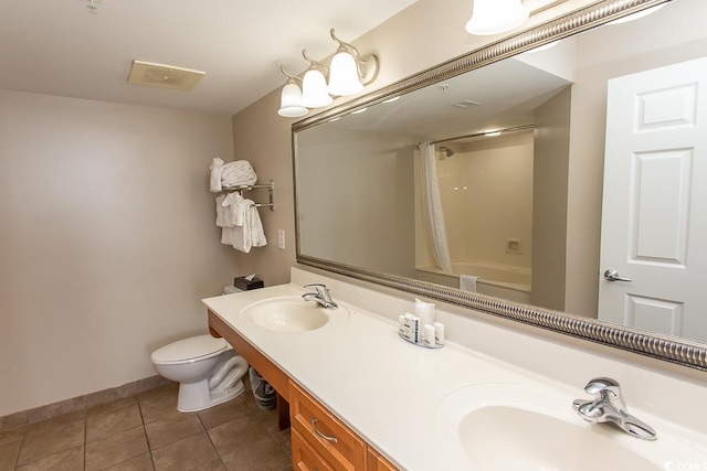 full bathroom with shower / bath combination with curtain, vanity, toilet, and tile patterned floors