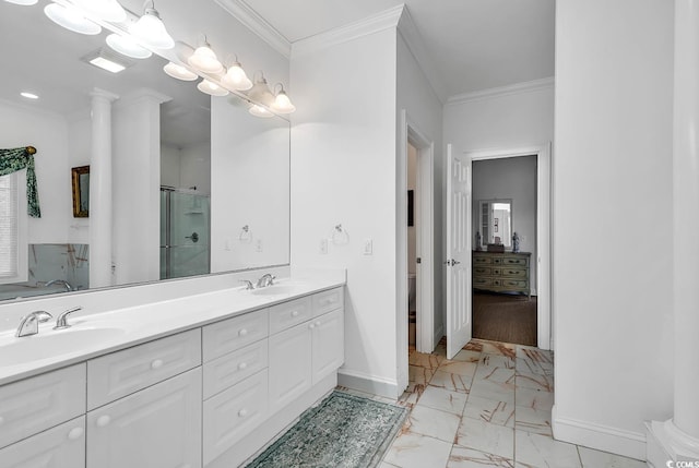 bathroom featuring walk in shower, ornamental molding, decorative columns, and vanity