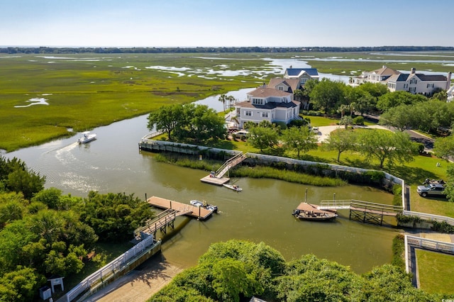 bird's eye view with a water view