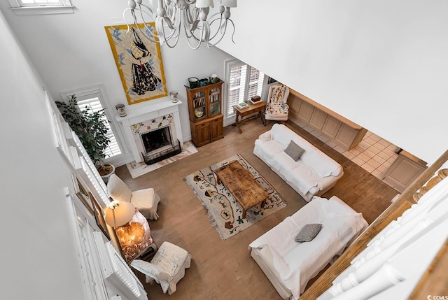 living room featuring a high ceiling and a notable chandelier