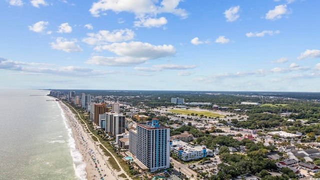 bird's eye view featuring a view of the beach and a water view