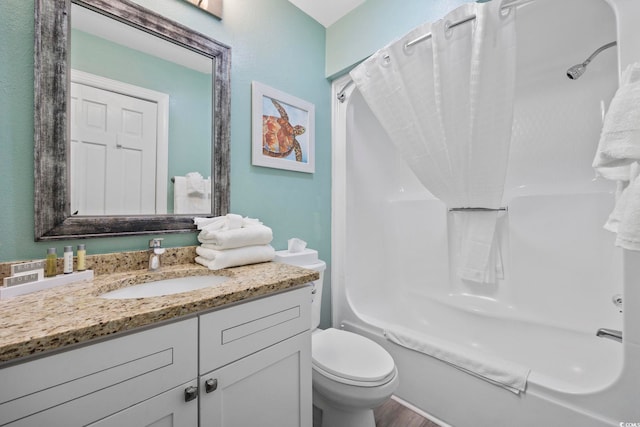 full bathroom with vanity, toilet, shower / tub combo with curtain, and hardwood / wood-style flooring