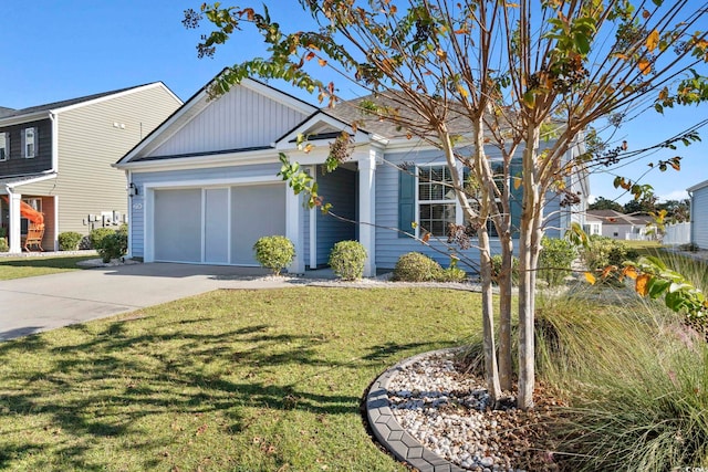 view of front facade featuring a garage and a front lawn