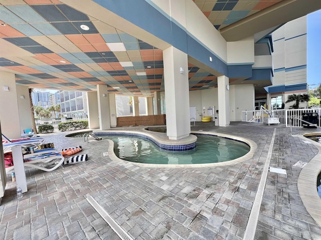 view of pool featuring a patio