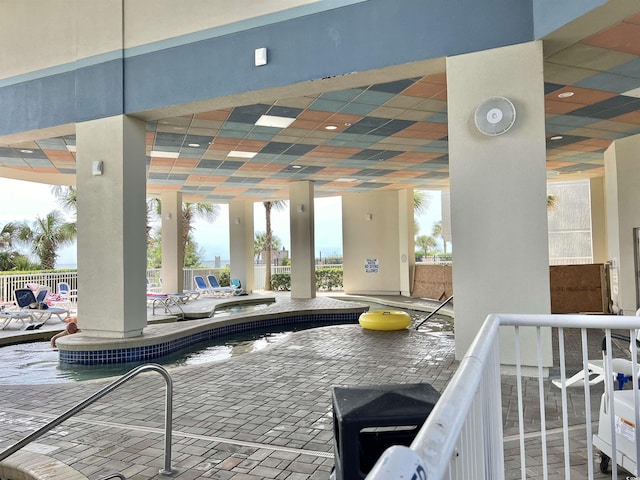 view of patio featuring a community pool