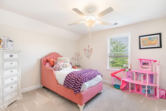 bedroom featuring ceiling fan, carpet, and vaulted ceiling