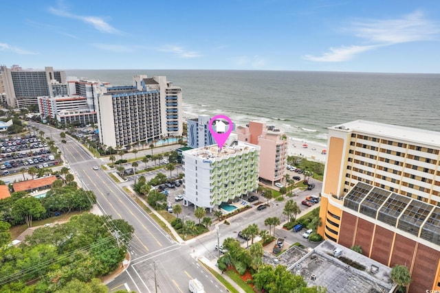 bird's eye view with a view of the beach and a water view