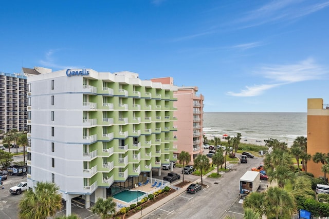 view of building exterior featuring a water view