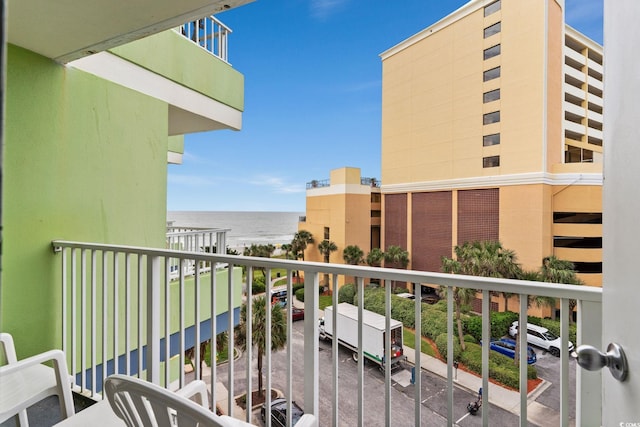 balcony featuring a water view