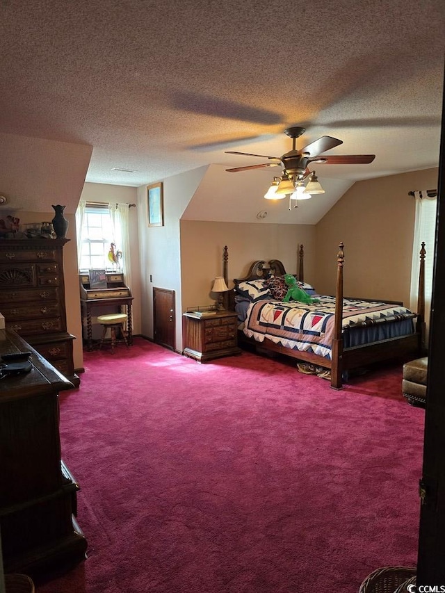 carpeted bedroom with a textured ceiling, lofted ceiling, and ceiling fan