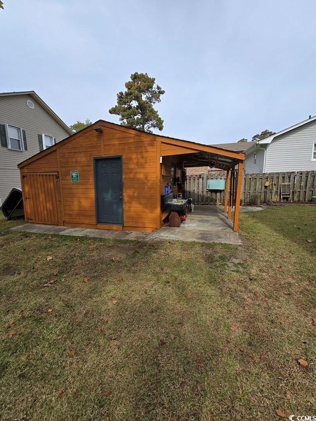 back of house with a yard