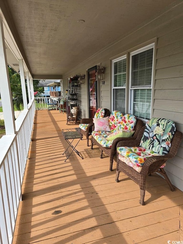 deck with covered porch