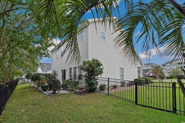 view of property exterior with a lawn