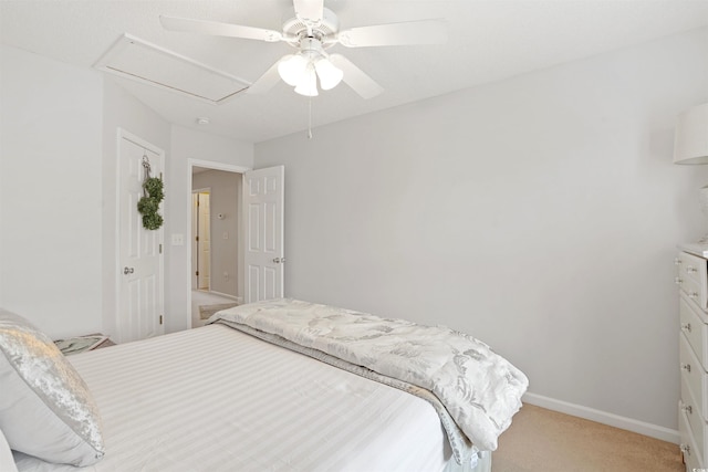 bedroom featuring light colored carpet and ceiling fan