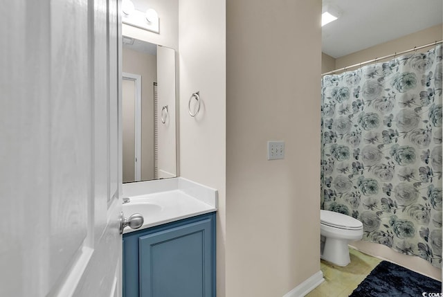 bathroom with tile patterned flooring, vanity, toilet, and a shower with shower curtain