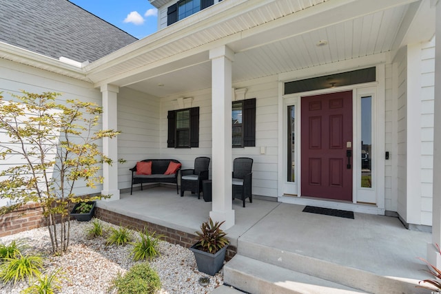 entrance to property with covered porch