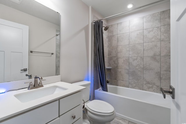 full bathroom featuring shower / bath combo with shower curtain, vanity, and toilet