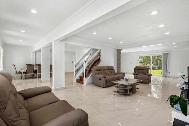 living room with ornamental molding