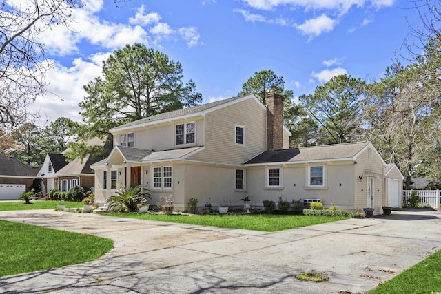 front of property with a garage