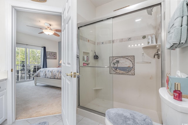 bathroom featuring walk in shower, tile patterned floors, toilet, and ceiling fan