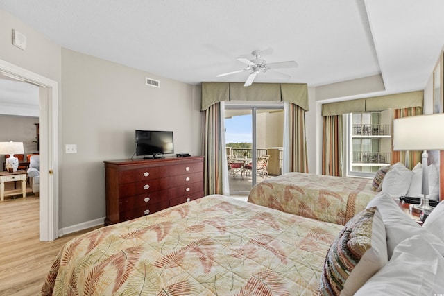 bedroom with access to outside, ceiling fan, and light hardwood / wood-style flooring