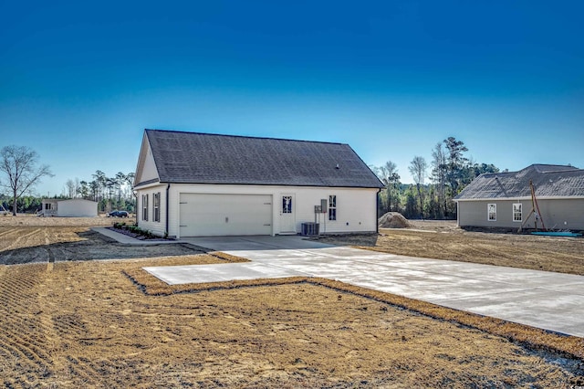 exterior space featuring a front yard and cooling unit