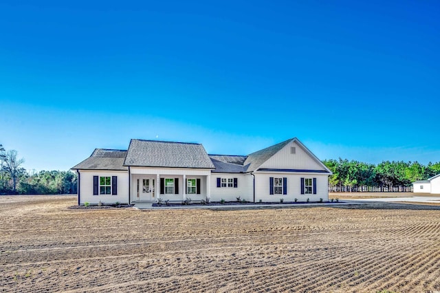 view of front of property featuring covered porch