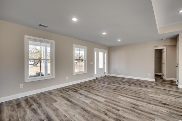 unfurnished room featuring light hardwood / wood-style flooring