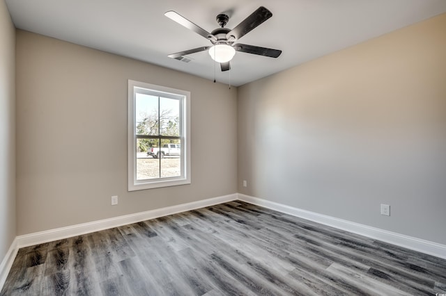 unfurnished room featuring ceiling fan and wood-type flooring