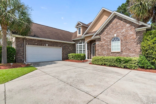 view of front of property featuring a garage