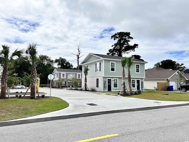 6306 Somerset Dr, Myrtle Beach, SC 29572 - colonial-style house featuring a front yard