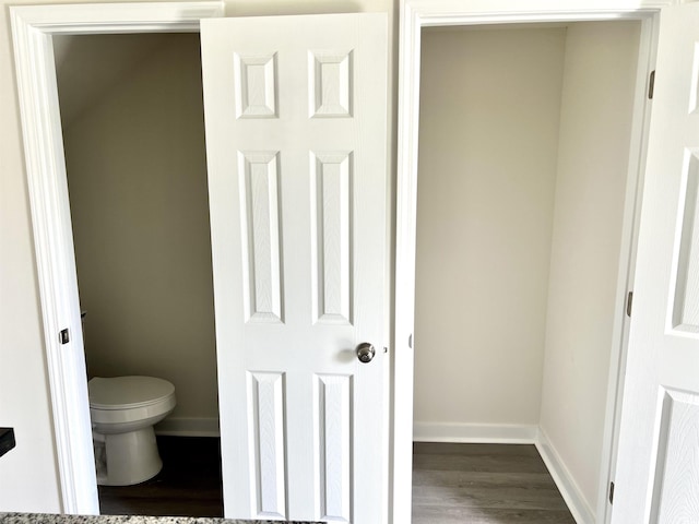 6306 Somerset Dr, Myrtle Beach, SC 29572 - bathroom with toilet, wood finished floors, and baseboards
