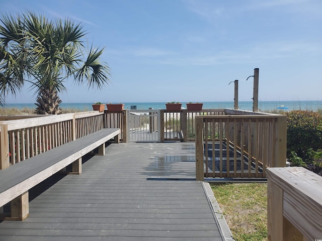 deck featuring a water view