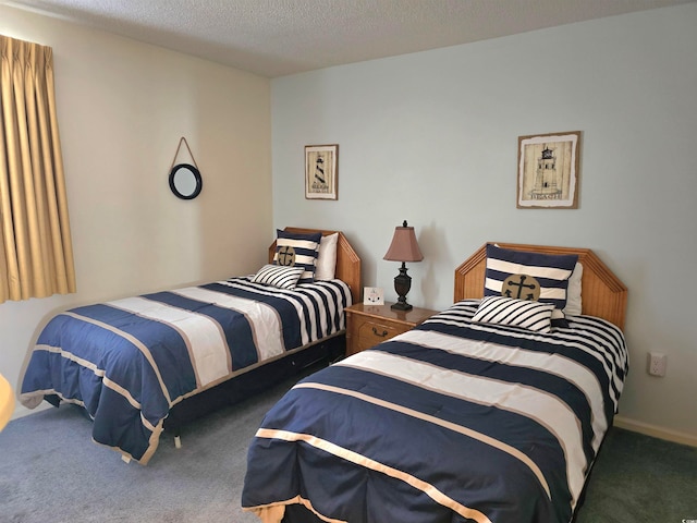 carpeted bedroom with a textured ceiling