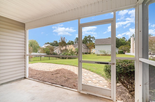 unfurnished sunroom with a healthy amount of sunlight