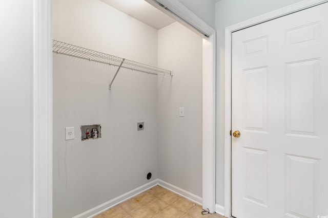 clothes washing area with hookup for an electric dryer and hookup for a washing machine