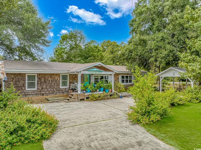 ranch-style house with a front lawn