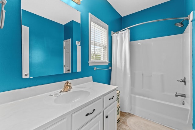 bathroom featuring tile patterned flooring, shower / bath combination with curtain, and vanity