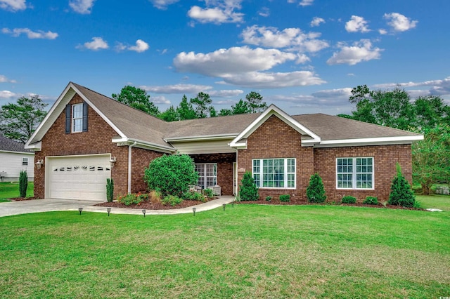 view of front facade with a garage and a front yard