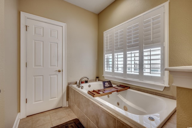 bathroom featuring a relaxing tiled tub and tile patterned floors