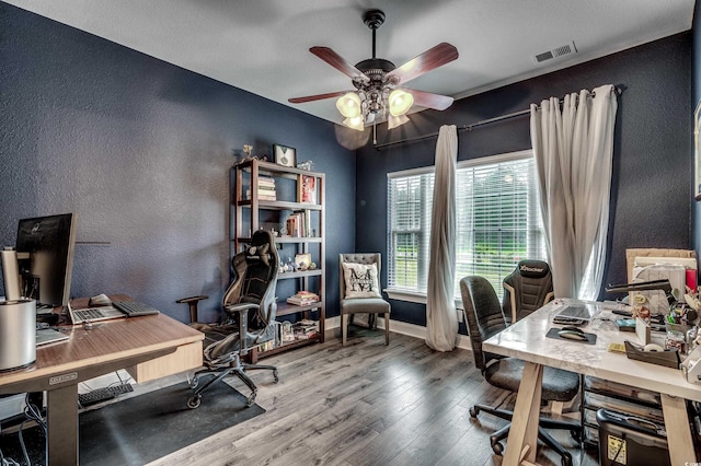 office area featuring wood-type flooring and ceiling fan