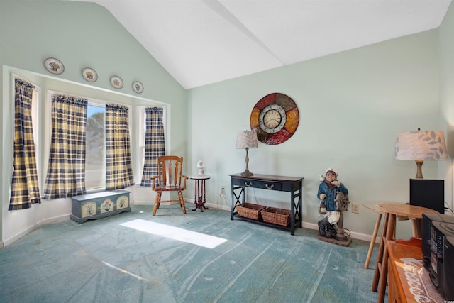 living area with lofted ceiling, baseboards, and carpet flooring