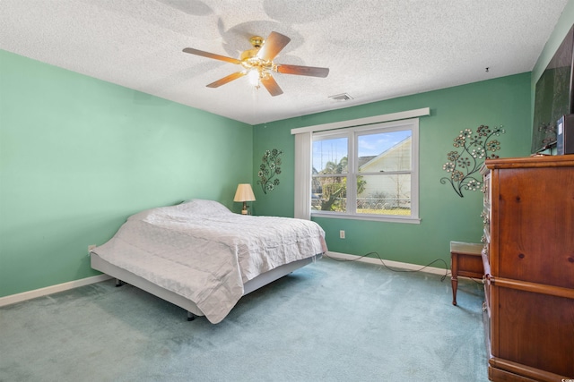 bedroom featuring light colored carpet, visible vents, and baseboards