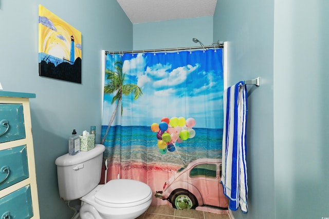 bathroom with walk in shower, a textured ceiling, toilet, and tile patterned floors