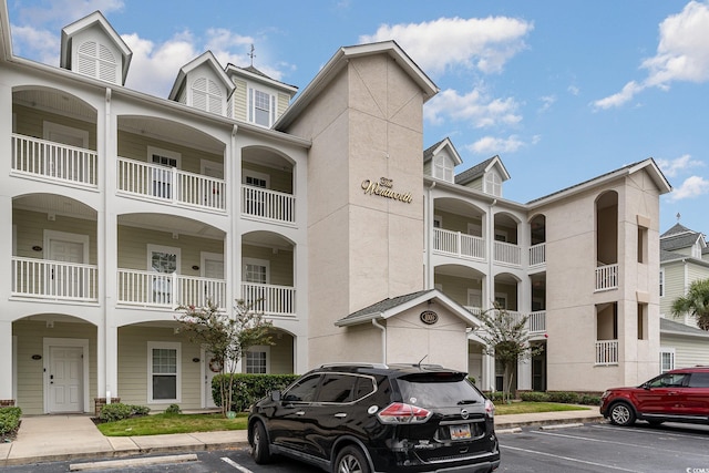 1009 World Tour Blvd Unit 301, Myrtle Beach, SC 29579 - view of property with uncovered parking
