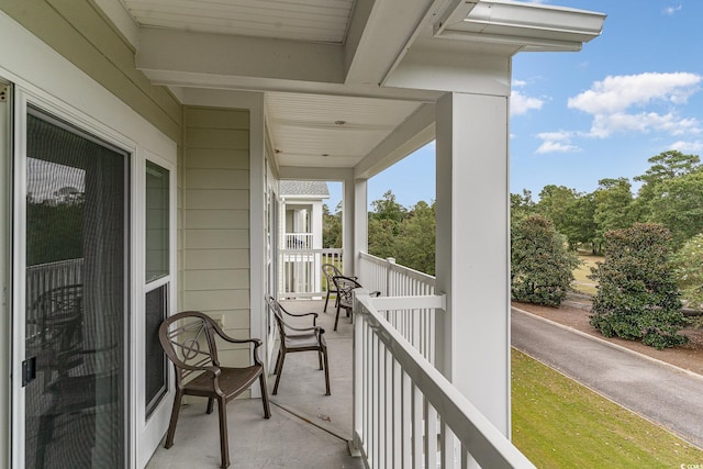 balcony featuring a porch