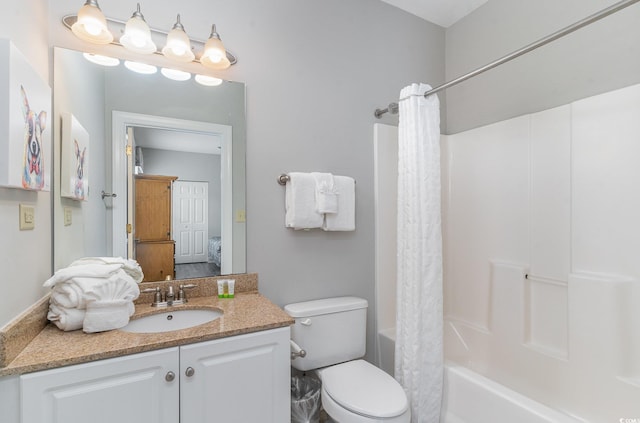 full bathroom featuring vanity, toilet, and shower / tub combo with curtain