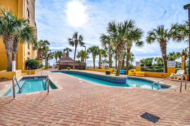 view of pool featuring a patio area