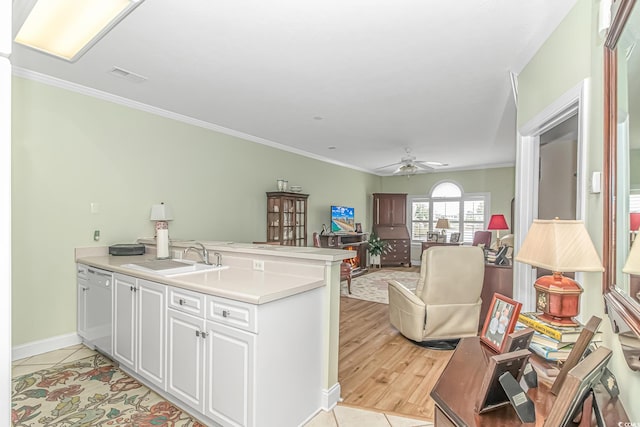 kitchen with ceiling fan, white cabinets, sink, dishwasher, and crown molding